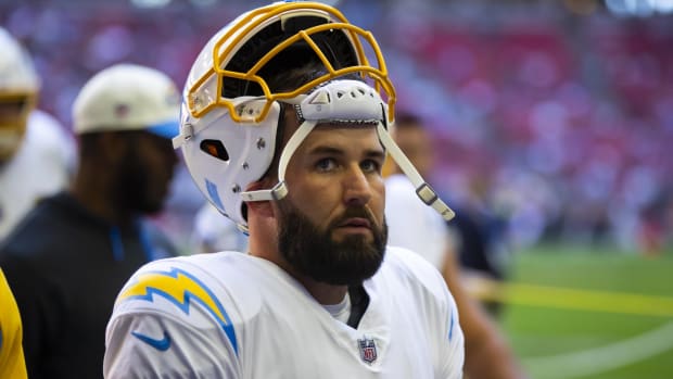 Chargers quarterback Chase Daniel looks up while on the sidelines during a game.